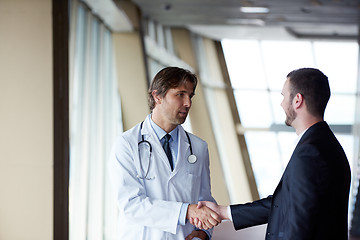 Image showing doctor handshake with a patient