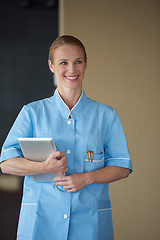 Image showing female doctor with tablet computer