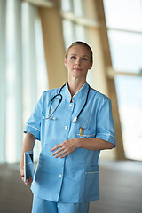 Image showing female doctor with tablet computer