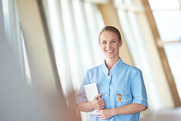 Image showing female doctor with tablet computer