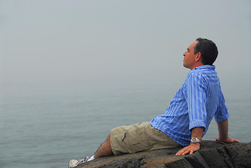 Image showing Man looking fog