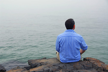 Image showing Man looking at fog