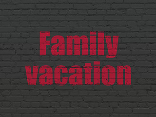 Image showing Vacation concept: Family Vacation on wall background