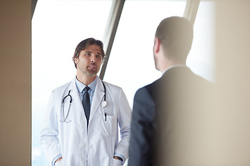 Image showing doctor handshake with a patient