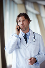 Image showing doctor speaking on cellphone