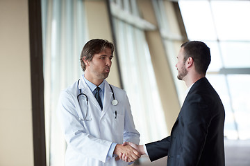 Image showing doctor handshake with a patient