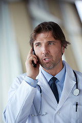 Image showing doctor speaking on cellphone