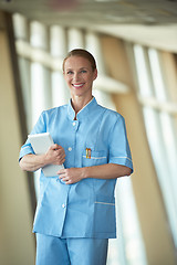 Image showing female doctor with tablet computer