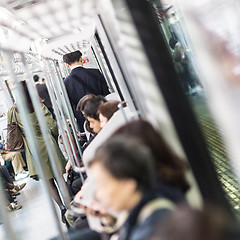 Image showing Passengers traveling by Tokyo metro.