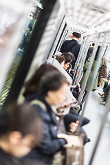 Image showing Passengers traveling by Tokyo metro.