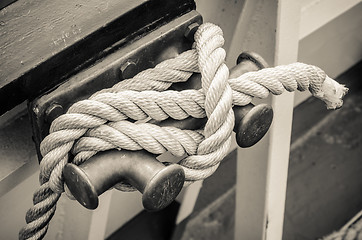 Image showing Rope tied to bollard sailboat, sepia