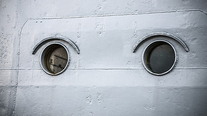 Image showing Round portholes warship, close-up