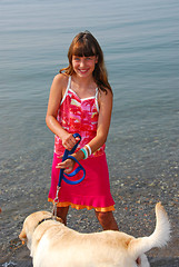 Image showing Girl playing dog