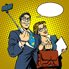 Image showing Selfie stick businessman and businesswoman photo smartphone