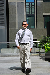 Image showing Businessman walk downtown