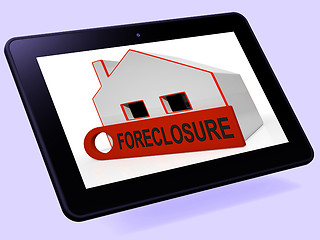 Image showing Foreclosure House Tablet Shows Repayments Stopped And Repossessi