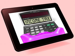 Image showing Income Tax Calculator Tablet Means Taxable Earnings And Paying T