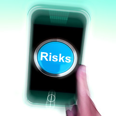 Image showing Risks On Mobile Phone Shows Investment Risks And Economy Crisis