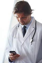 Image showing doctor speaking on cellphone