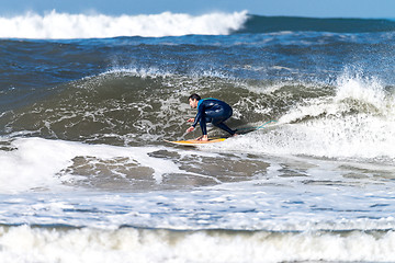 Image showing Surfing the waves