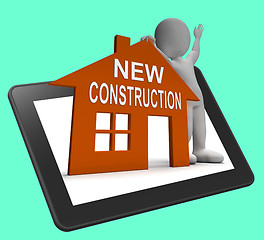 Image showing New Construction House Tablet Shows Newly Built Property