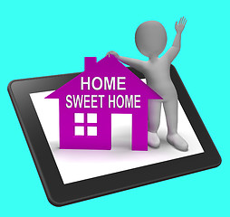 Image showing Home Sweet Home House Tablet Shows Familiar Cozy And Welcoming