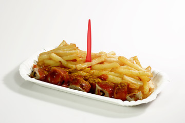 Image showing Sausage with fries