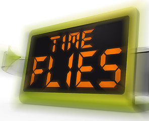 Image showing Time Flies Digital Clock Means Busy And Goes By Quickly