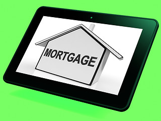 Image showing Mortgage House Tablet Shows Property Loans And Repayments