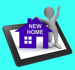 Image showing New Home House Tablet Shows Buying Property And Moving In