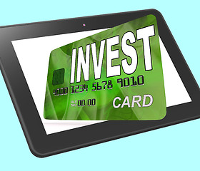 Image showing Invest on Credit Debit Card Tablet Shows Investing Money