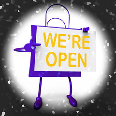 Image showing We\'re Open Sign on Shopping Bag Shows New Store Launch Or Openin