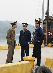 Image showing Police and marine officers