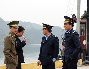 Image showing Police and marine officers