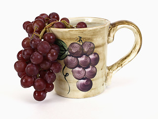 Image showing Red Grapes over Grape Cup