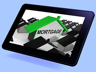 Image showing Mortgage House Tablet Means Debt And Repayments On Property