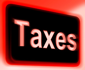 Image showing Taxes Sign Shows  Tax Or Taxation