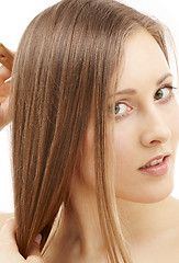 Image showing combing woman