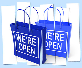 Image showing We\'re Open Shopping Bags Show Grand Opening or Launch