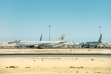 Image showing Qatar airport strip with airplanes