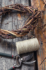 Image showing Weaving wreath of vines