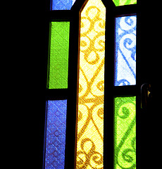 Image showing colorated glass and sun in morocco africa window and light