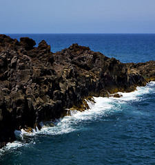 Image showing people stone volcanic spain  water coast 