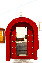 Image showing white  red brown  door in   europe and    wall