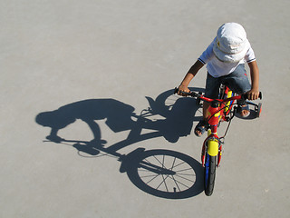 Image showing Boy Riding A Bike