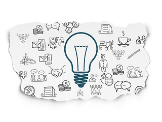 Image showing Business concept: Light Bulb on Torn Paper background