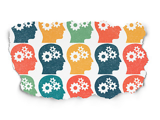 Image showing Advertising concept: Head With Gears icons on Torn Paper background