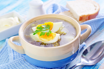 Image showing green soup with boiled eggs