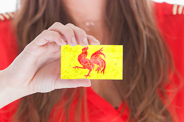 Image showing Woman showing a blank business card