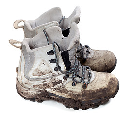 Image showing Pair of old dirty trekking boots